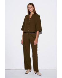 Dilvin - Wide-Leg Crepe Trousers - Lyst