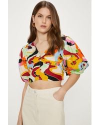 Oasis - Linen Mix Puff Sleeve Twist Front Floral Top - Lyst