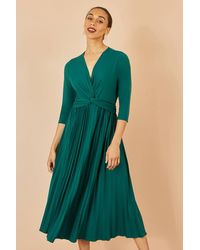 Yumi' - Jersey Knot Waist Pleated Midi Dress - Lyst