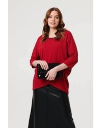 Izabel London - Asymmetric Zip Hem 3/4 Sleeve Tunic Top - Lyst
