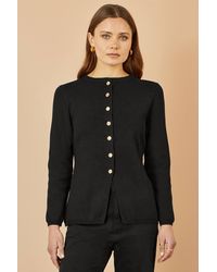 Yumi' - Knitted Fitted Button Down Peplum Cardigan - Lyst