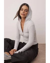WOVCOR - Ribbed Button Front Hooded Stretch Knit Blouse - Lyst