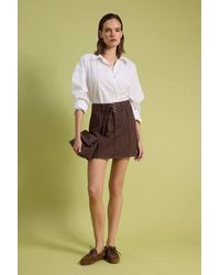 WOVCOR - Belt Detail Mini Denim Skirt - Lyst