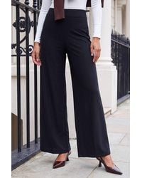 Roman - Wide Leg Stretch Trousers - Lyst