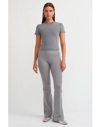 Dilvin - High-Waist Ribbed Flare Pants - Lyst