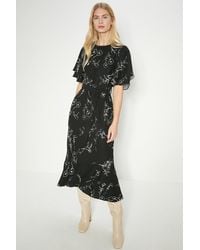 Oasis - Petite Mono Floral Printed Frill Detail Belted Midi Dress - Lyst