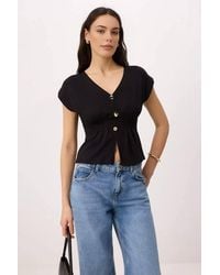 WOVCOR - Button Detail V Neck Cap Sleeve Peplum Top - Lyst