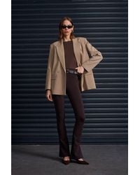 Dilvin - Belted Skinny Flare Pants - Lyst