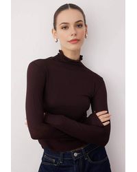 WOVCOR - Sheer Stand Collar Stretch Knit Long Sleeve Blouse - Lyst