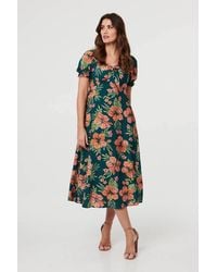 Izabel London - Floral Tie Short Puff Sleeve Midi Dress - Lyst