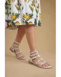 Dorothy Perkins - Micheala Faux Leather Studded Gladiator Flat Sandals - Lyst