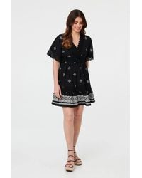 Izabel London - Border Print Lace 1/2 Sleeve Short Dress - Lyst