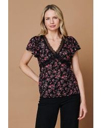 Izabel London - Ditsy Floral Cap Sleeve Lace Trim Top - Lyst