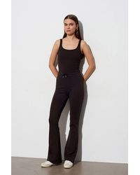 Dilvin - Mid-Waist Flare Jersey Pants W/ Drawstring - Lyst