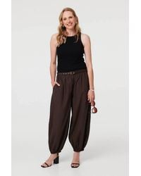 Izabel London - Belted Relaxed Wide Leg Barrel Trousers - Lyst