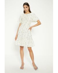 Oasis - Textured Floral Bow Back Mini Dress - Lyst