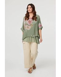 Izabel London - Floral 3/4 Sleeve Layered Tunic Blouse - Lyst