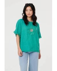 Izabel London - Frayed Edge Floral Embellished Top - Lyst
