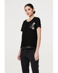 Izabel London - Metallic Star Detail Relaxed T-Shirt - Lyst