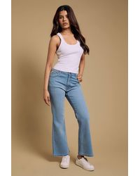 Dorothy Perkins - Petite Comfort Stretch Bootcut Jeans - Lyst