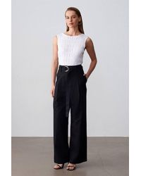 Dilvin - Belted Wide-Leg Linen Blend Trousers - Lyst