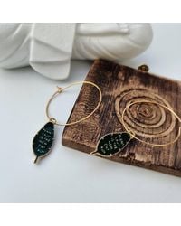 The Colourful Aura - Leaf Charm 30Mm Floral Hoop Earrings - Lyst