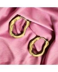 The Colourful Aura - Irregular Wave Oval Hoop Earrings, 1 Inch Stainless Steel - Lyst