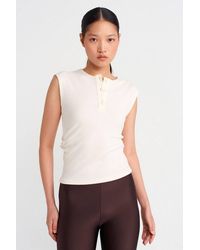 Dilvin - Sleeveless Ribbed Button-Front Blouse - Lyst