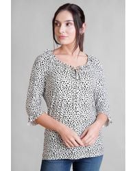 Enorsia - Polka Dot Prints Frill Neck Jersey Blouse - Lyst