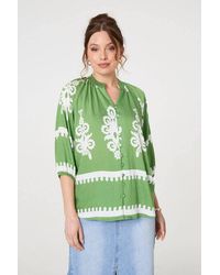 Izabel London - Ikat Print 3/4 Sleeve Relaxed Blouse - Lyst