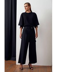 Dilvin - Wide-Leg Belted Crepe Trousers - Lyst