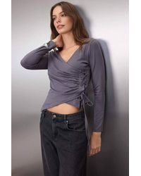 WOVCOR - V Neck Fitted Wrap Knit Blouse W/ Tie Side Detail - Lyst
