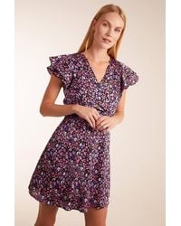 Blue Vanilla - Animal Print Wrap Ruffle Mini Dress - Lyst