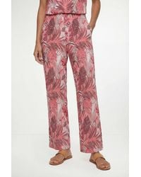 Wallis - Petite Tropical Print Elasticated Waist Wide Leg Trouser - Lyst