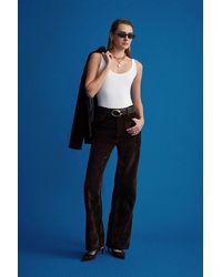 Dilvin - Sleeveless Ribbed Cotton-Blend Bodysuit - Lyst