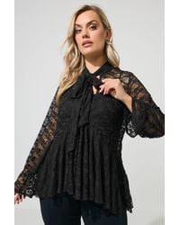 Yours - Flared Lace Peplum Tie Neck Blouse - Lyst