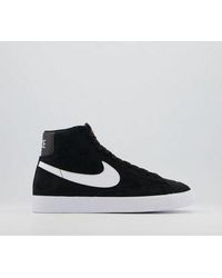 black and gold nike high tops