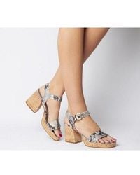 office all rise black chunky heeled two buckle boots