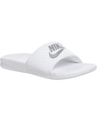 white nike slippers