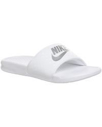 nike white sliders