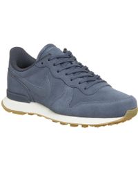 nike internationalist trainers in mushroom with metallic trim nike internationalist trainers in mushroom with metallic trim