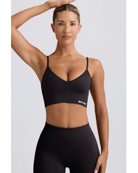 BO+TEE - Define Luxe V-Neck Sports Bra - Lyst