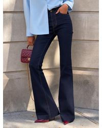 Oh Polly - High-Rise Flared Jeans - Lyst