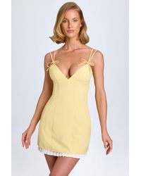 Oh Polly - Bow-Detail Pleated Mini Dress - Lyst