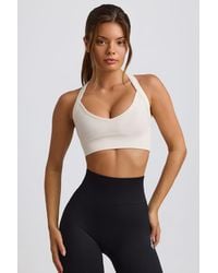 BO+TEE - Super Sculpt Seamless Cross-Back Sports Bra - Lyst