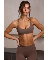 BO+TEE - Soft Active Racerback Sports Bra - Lyst