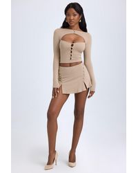 Oh Polly - Modal Button-Detail Low-Rise Mini Skirt - Lyst