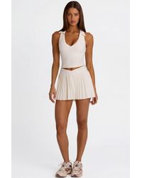 BO+TEE - Soft Active Crossover Pleated Mini Skort - Lyst