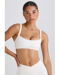 BO+TEE - Soft Active Contrast-Trim Sports Bra - Lyst