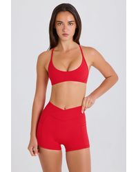 BO+TEE - Soft Active Pocket V-Waist Mini Shorts - Lyst